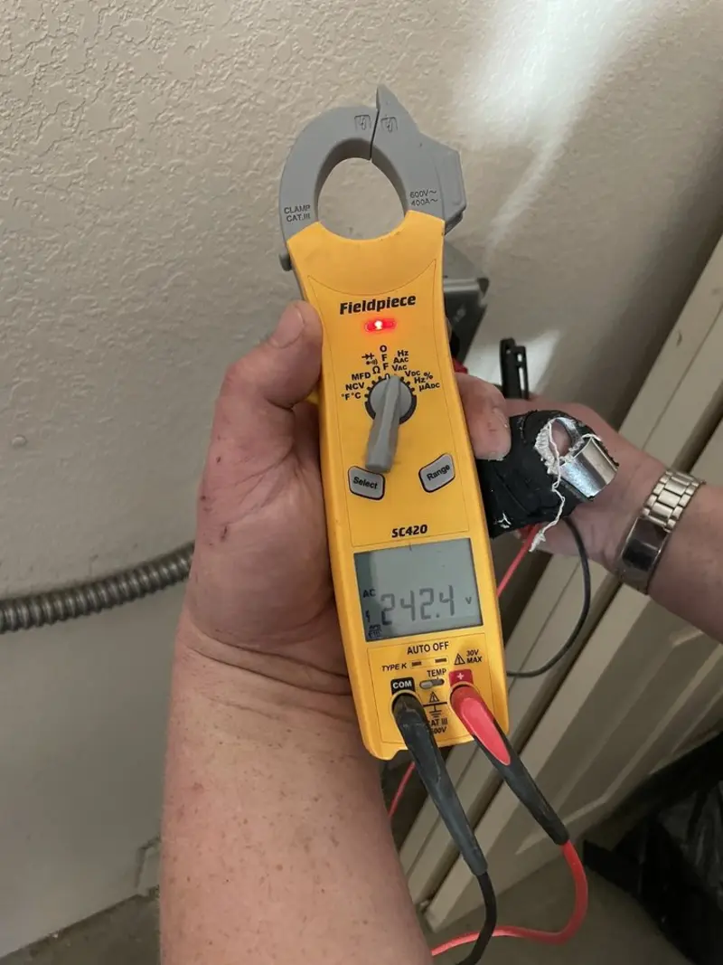 Voltage testing with clamp meter during Whole House Surge Protector in Okmulgee